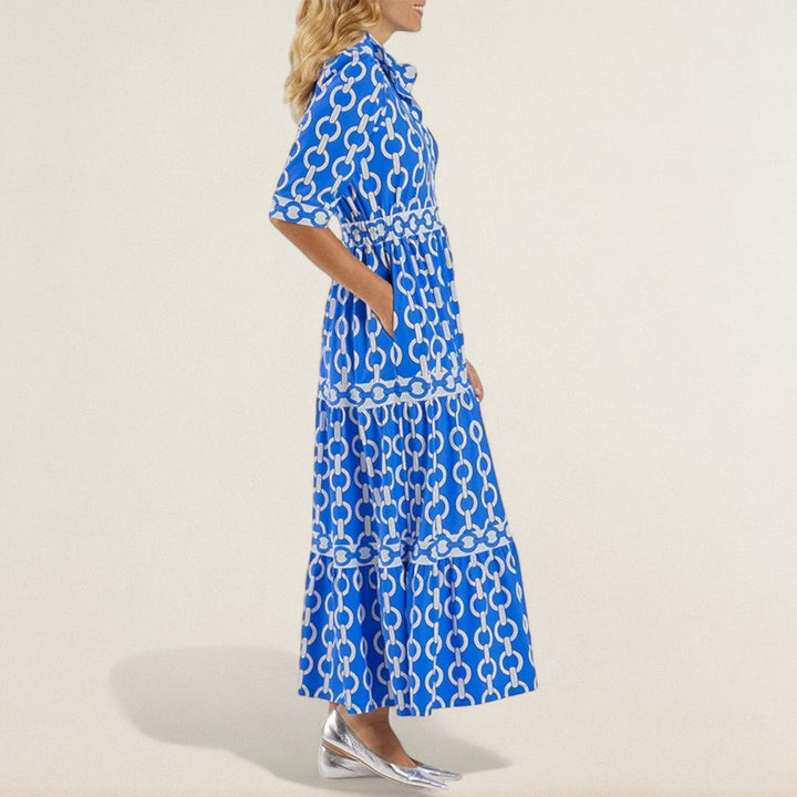 Μαρία – Ροή φόρεμα με στυλάτη παρουσία