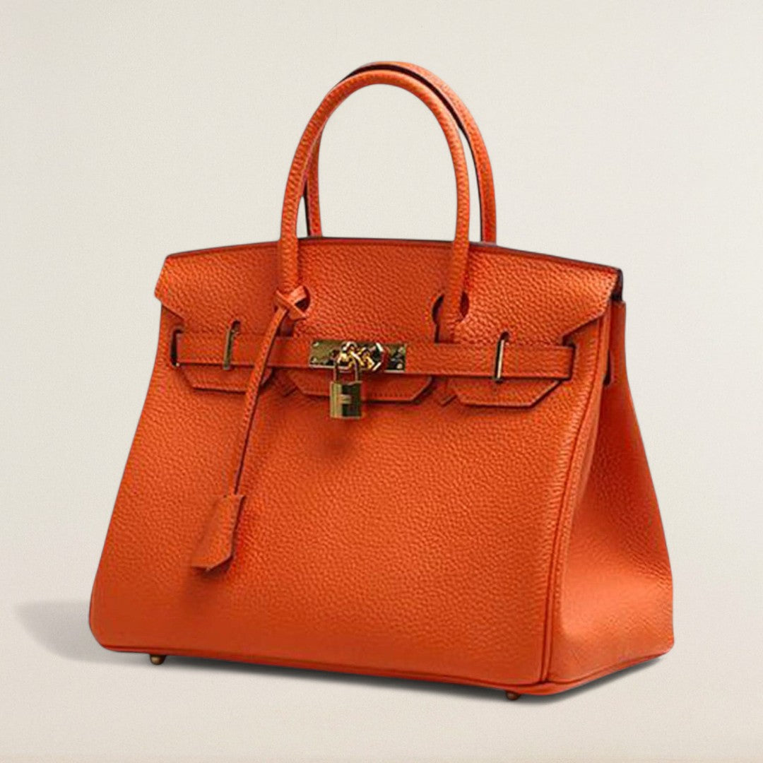 Ρενατά – Κλασική και κομψή με κλείσιμο που κάνει δήλωση